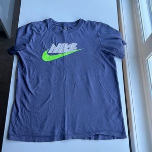 This is a short sleeve Nike tee. This is a blueish purple and boys size large.